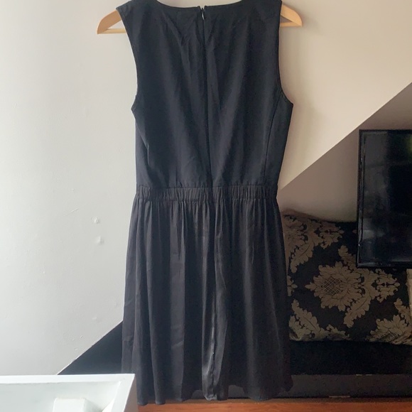 Simple black dress with leather front - Picture 2 of 2